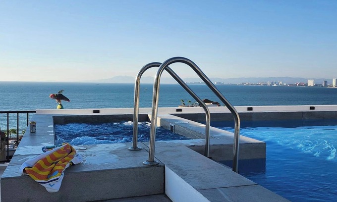 Puerto Vallarta Condo | 360 Rooftop Views, Charming, Modern, Quiet and steps to Shops and Entertainment!