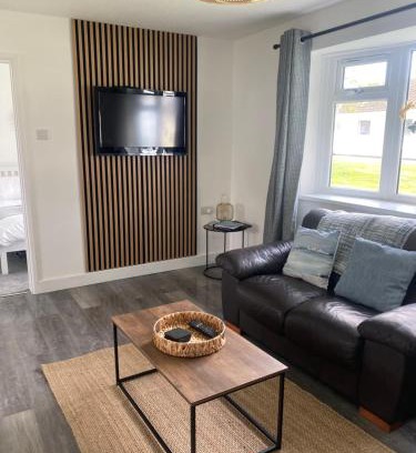 Scurlage House | 37 Gower holiday village Ty Seren Cosy 2 bedroom chalet with a seasonal indoor pool
