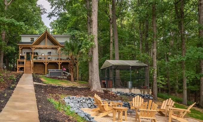 Mount Gilead House | 4 bd Lakefront Oasis with Hot Tub, Dock, FirePits, Blackstone grill, & lake toys