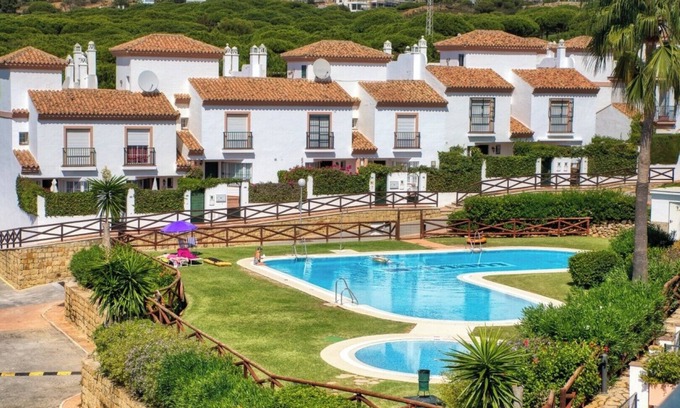 Urbanizacion Hacienda las Chapas House | 4 bedrooms, shared pool, games room & sea view.