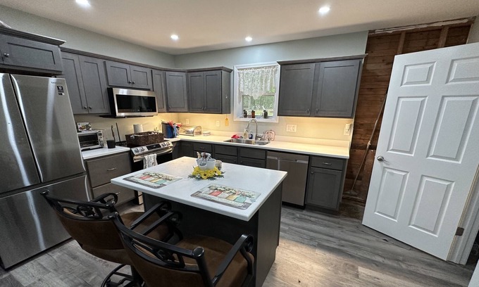 Eva Apartment | 4 miles from Nathan Bedford Forest State Park and Kentucky Lake