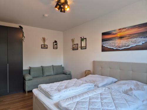 Dornum Apartment | 4 separate Ferienwohnungen in Traumlage mit Garten