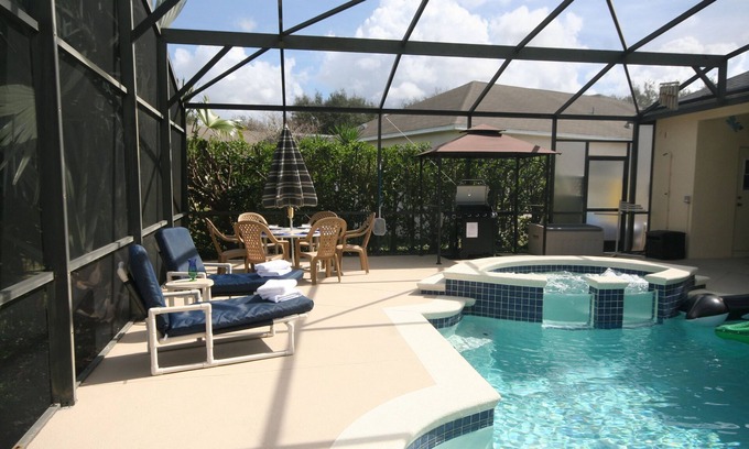 Grand Reserve Villa | 4BR Luxury Villa with Games Room, Lake Views, 10 minutes to Disney Property