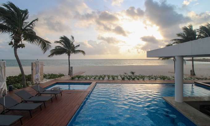 Playa Mujeres Apartment | 4th-floor resort apt with outdoor pools, pool spas, tennis, gym, & balcony