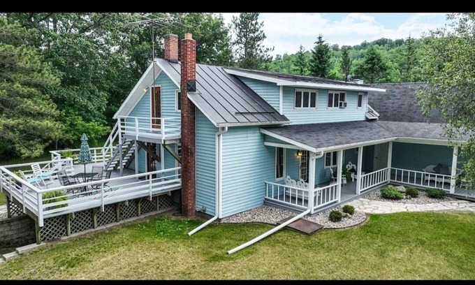 Waupaca House | 5 Bedroom home with 1580ft of Waupaca River frontage! With hot tub!