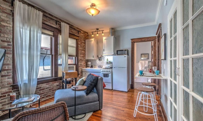 Midtown Apartment | #5 · Classic woodwork & details in 1912 Colonial!