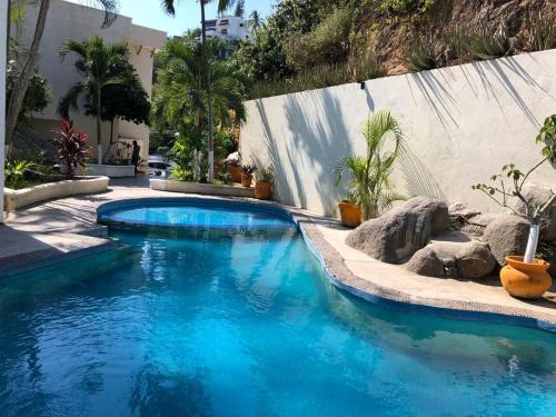 Las Hadas Apartment | 62 ROOM PENINSULA CAPITAN
