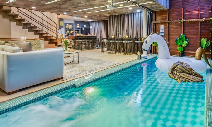 Zona Rosa House | 9BR Indoor Heated Pool & Jacuzzi | In Lleras Park