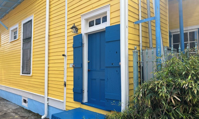 Treme Apartment | A funky-chic one-bedroom apartment with a private entrance and a full kitchen.