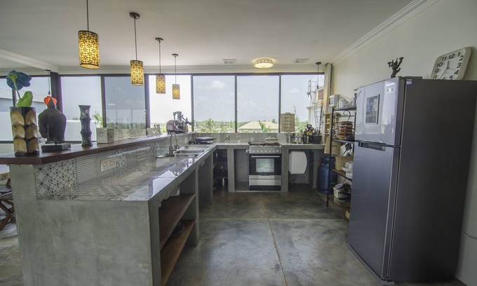Siem Reap House | A home away from home! Coliving building with private rooms and shared areas.