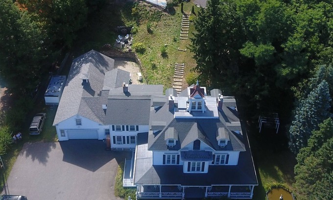 Center Harbor House | A majestic fully restored mansion to call your own. 8 Bedrooms+8.5 Bathrooms.