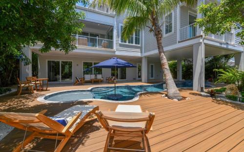 Anna Maria House | A Shore Thing - Second To None Spacious Waterfront Luxury Dock Pool Spa Rooftop Water Views