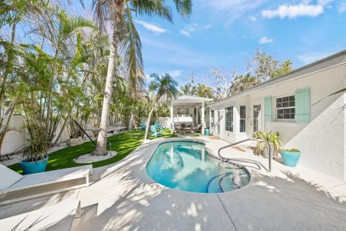 Anna Maria House | A Wave From It All - New Luxury Renovated Home Heated Pool Cabana Hammock Walk to Beach