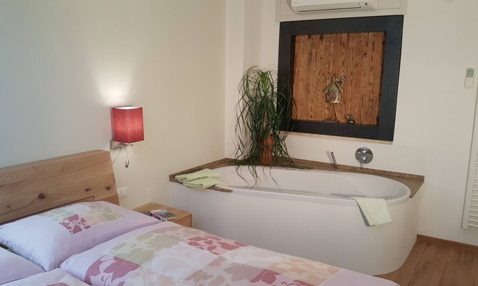 Lana Apartment | Above the roofs of Lana - Green Apartment - via Dolce Vita