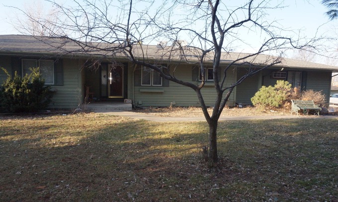Urbandale House | Acreage InTown 4 BR, 2 Bath 3,300 sq ft half house option with gymnasium.