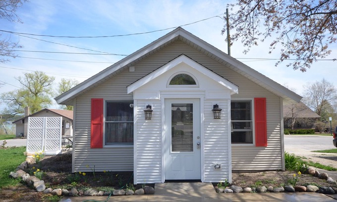Suttons Bay Cottage | Adorable studio cottage in Suttons Bay. Air conditioning. Pet friendly.