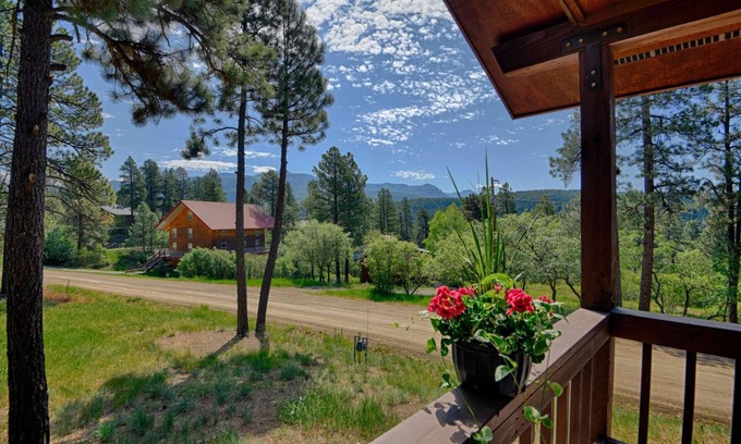 San Juan River Village House | All Decked Out: Wraparound Deck, Stunning Mountain Views, Near Downtown Pagosa & Wolf Creek Ski Area