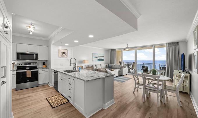 Open Sands Condo | Amazing Balcony View-Beachfront-Steps to Beach-King Bed-3 Pools-Starbucks