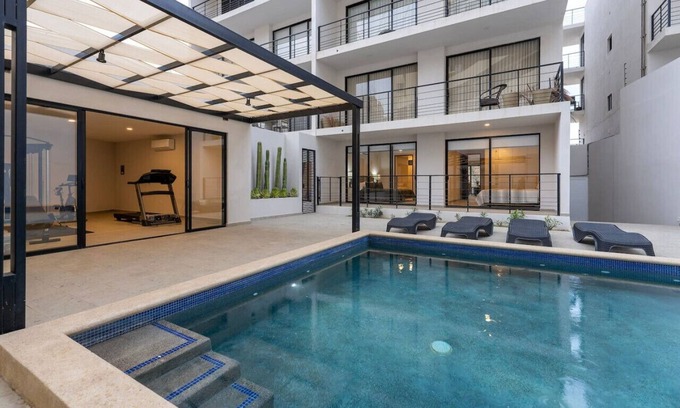 Libertad Apartment | Amazing New 2 BR 5 Min Downtown Pool Gym Parking