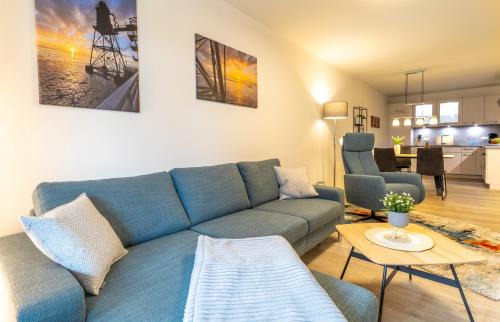 Dorumer Neufeld Apartment | Ankerpunkt Südost - Ferienwohnung mit Garten und Sauna