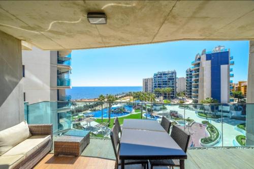 Punta Prima Apartment | Apartamento Dos Amigos, Sea Senses , sea view and 3 swimming pools, one heated , parking space