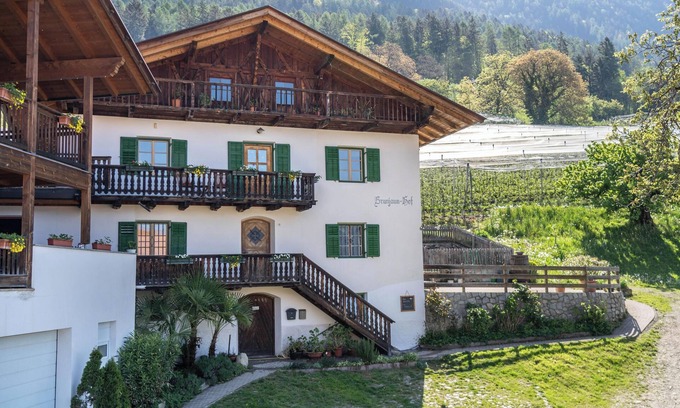 Schenna Apartment | Apartment “Brunjaunhof” on a Farm with Mountain View, Balcony & Garden