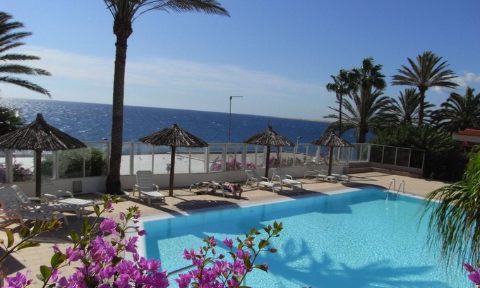 San Agustin Apartment | Apartment by the sea with a fantastic view and a heated pool