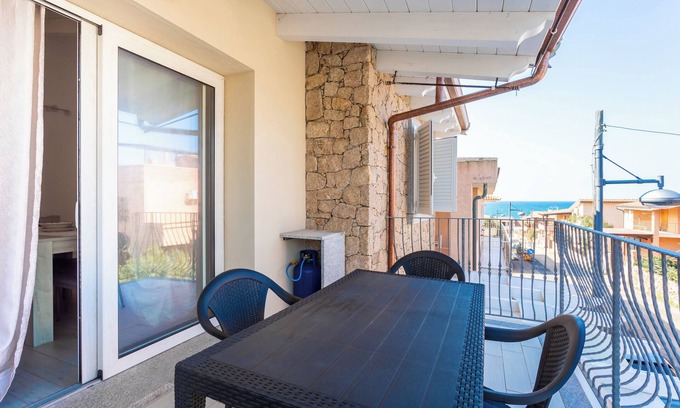 Trinita d'Agultu e Vignola Apartment | Apartment 'Casa Macis Vista Mare' with Sea View, Private Terrace and Air Conditioning