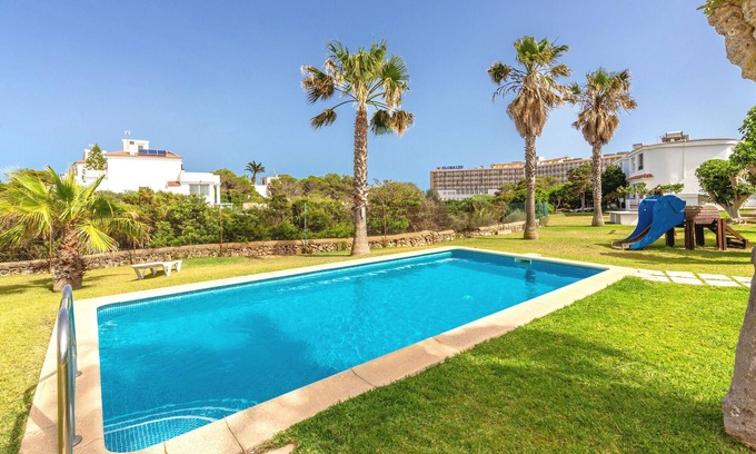 Los Delfines Apartment | Apartment 'De Playa En Ciutadella' with Shared Pool, Shared Garden and Wi-Fi