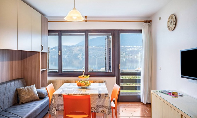 Calceranica al Lago Apartment | Apartment 'Garden Alle Barche - Marina 7' with Lake View, Shared Garden and Wi-Fi