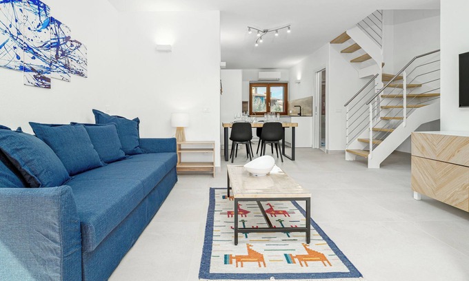 Baia Caddinas Apartment | Apartment 'Ginepro' with Sea View, Wi-Fi and Air Conditioning