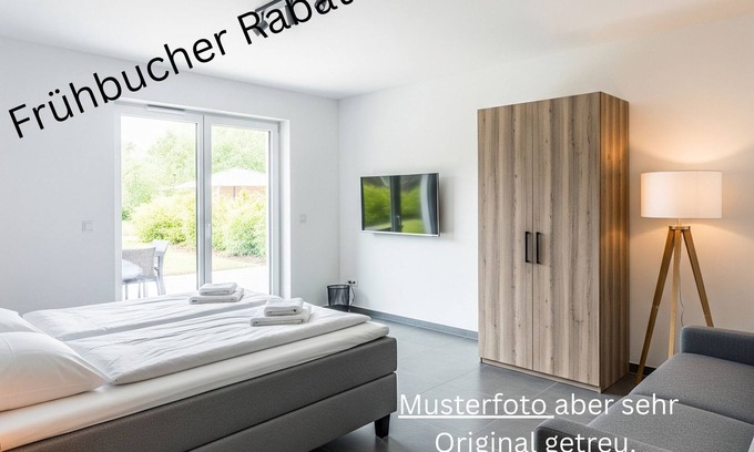 Niederemmel Apartment | Apartment - ground floor apartment, 70 qm², new kitchen, terrace, parking lot, modern, up to 4 pers