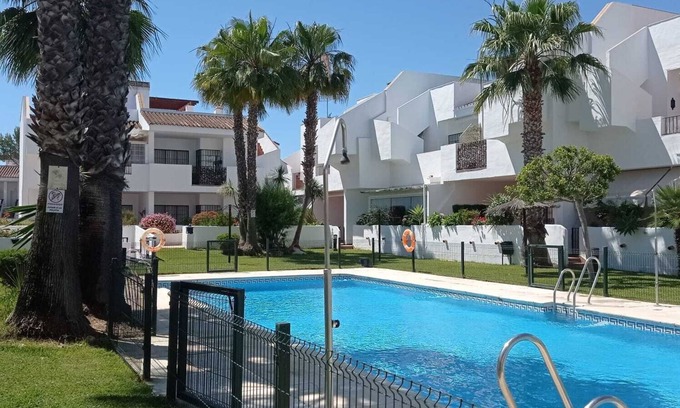 Isla Cristina Apartment | Apartment in Islantilla (Golf) with magnificent common areas and swimming pool.