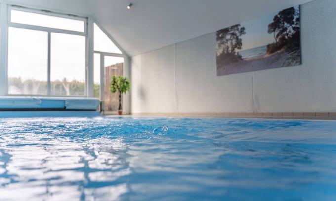 Dassow Apartment | Apartment in Travemünde near, on the ground floor with pool, sauna, WiFi, large garden