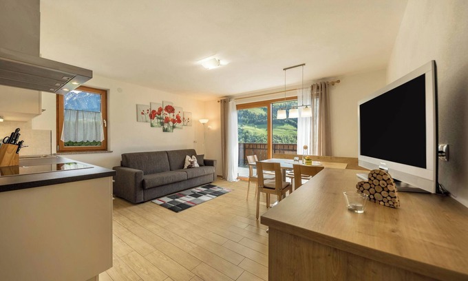 San Martino in Passiria Apartment | Apartment “ Pfandlerhof Rot” with Mountain View, Wi-Fi, Balcony & Garden
