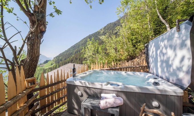 San Martino in Passiria Apartment | Apartment “ Bergsuite” with Mountain View, Balcony, Garden & Wi-Fi