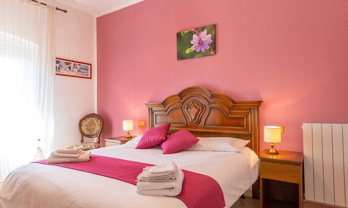 Rosignano Marittimo Apartment | Apartment 'Malva' with Shared Pool and Garden