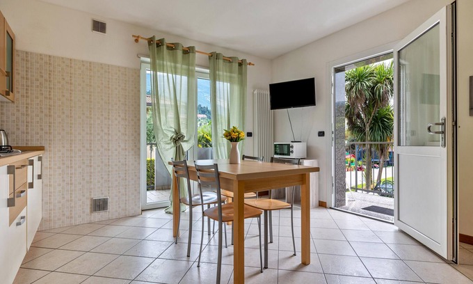 Torbole sul Garda Apartment | Apartment 'N1 Green Apartment' with Mountain View, Shared Garden and Balcony