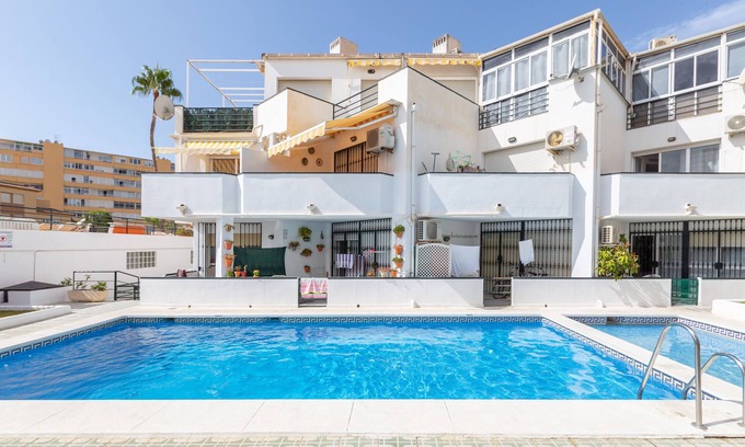Carihuela Apartment | Apartment "Piso Carlota Alessandri" with Shared Pool & Wi-Fi