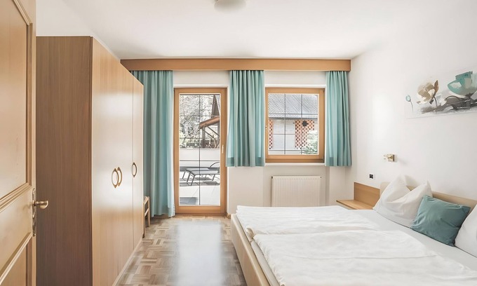 Silandro Apartment | Apartment 'Schnatzhof Typ B9' with Mountain View, Shared Pool and Wi-Fi