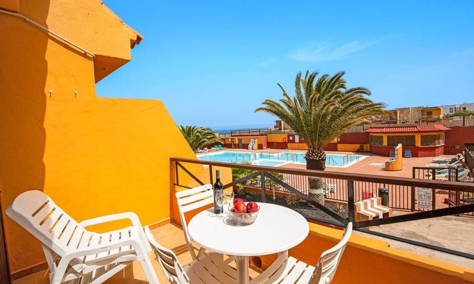 Caleta de Fuste Apartment | Apartment 'Surf Home Sea View' with Sea View, Shared Pools & Wi-Fi