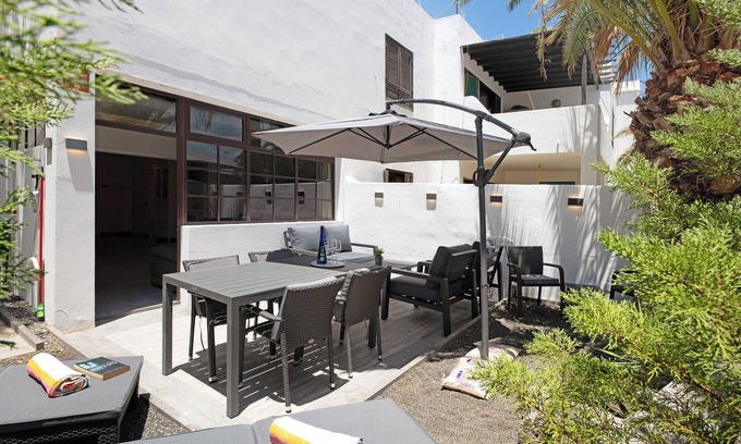 Puerto del Carmen Apartment | Apartment 'Tranquilidad 300m To Beach' with Private Terrace, Shared Garden and Wi-Fi