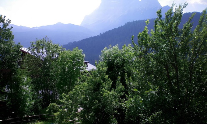 San Vito di Cadore Apartment | Apartment 'Villa Cleila Rossa A' with Mountain View, Shared Garden and Balcony