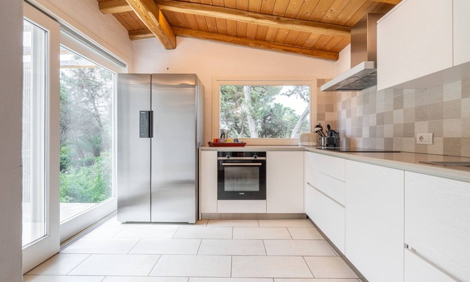 Notteri Apartment | Apartment 'Villa Flavia' with Shared Terrace, Private Garden and Air Conditioning