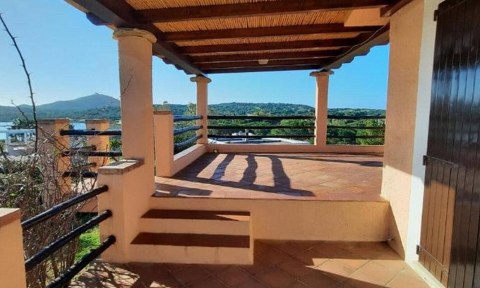 Notteri Apartment | Apartment 'Villa Porto Giunco' with Sea View, Private Terrace and Air Conditioning
