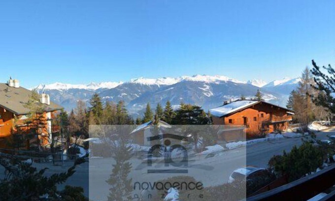 Anzere Apartment | Apartment with an entrance corridor, 1 bedroom with 2 simple beds and 1 bathroom/WC. Living-room wit