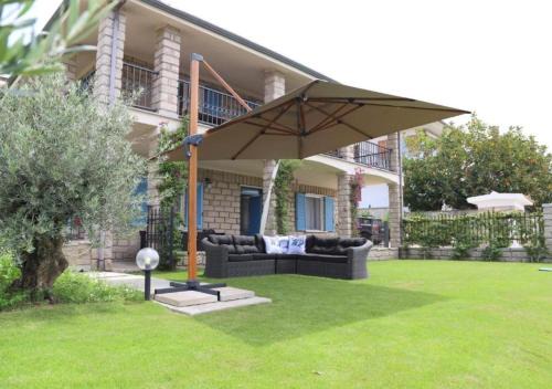 Badesi Villa | Appartamento in Villa di 150 Mq - vista mozzafiato fronte mare con giardino privato