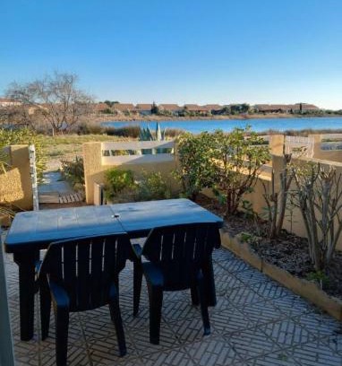 Les Ayguades Apartment | Appartement avec jardin, vue sur étang , proximité mer Gruissan Ayguades