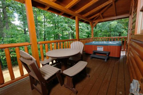 Chalet Village House | Arcade game, hot tub, spacious beautiful log cabin! Gatlinburg log cabin!
