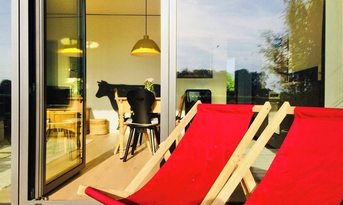 Stephanskirchen Apartment | Architektur trifft Seenähe. Wohlfühlunterkunft mit Blick in die Natur und Berge.